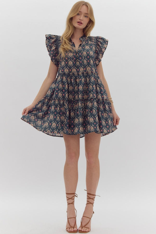 Entro Printed v-neck mini dress featuring pockets at side