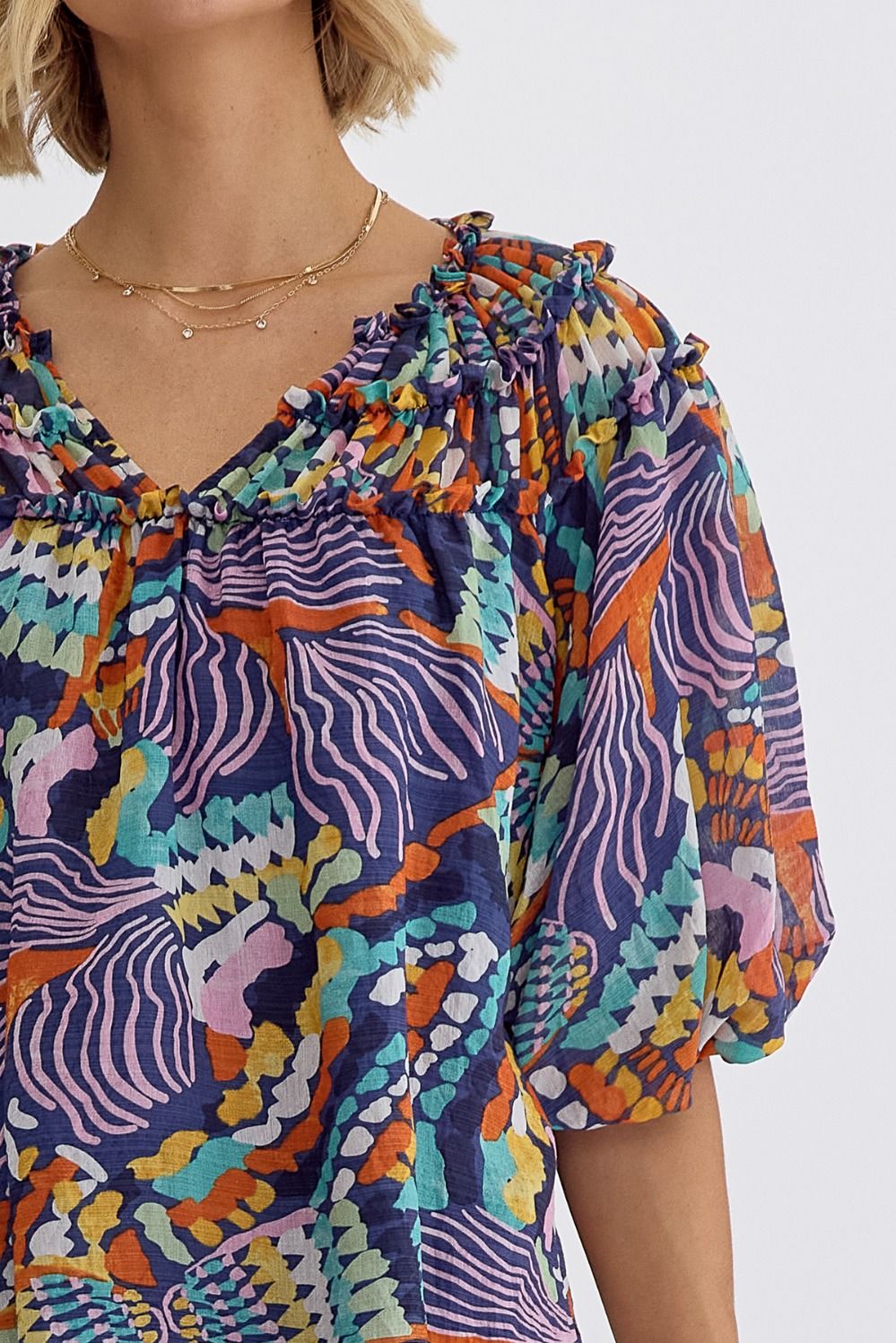 Entro Printed v-neck Half Sleeve top featuring shirring detail at fron